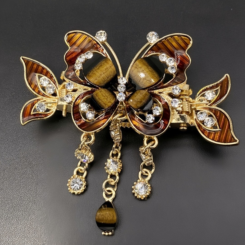 Ethnic Fashion Design - Elegancka spinka do włosów z motywem